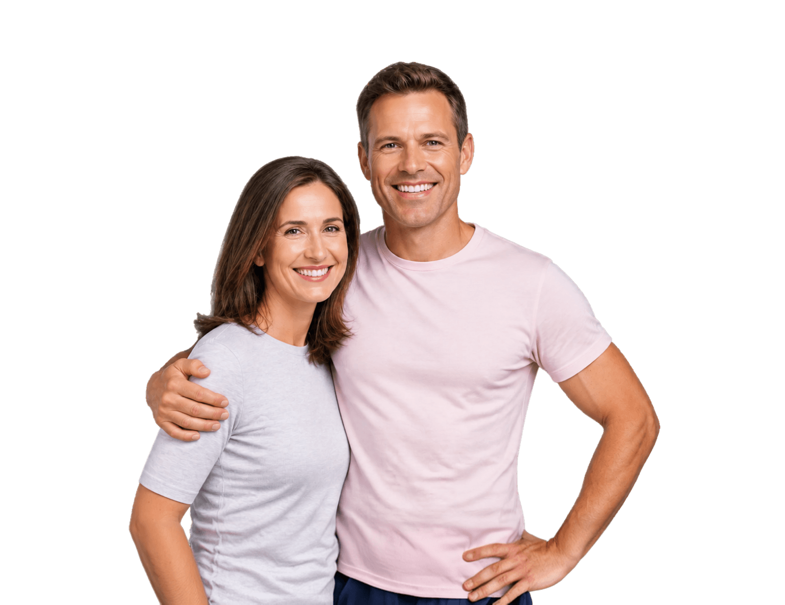 A smiling couple in soft pink clothing